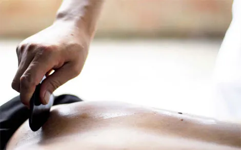 Gua Sha på ryggen